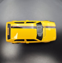 Load image into Gallery viewer, Hot Wheels 2018 Volkswagen Golf Yellow #171 Then and Now 5/10