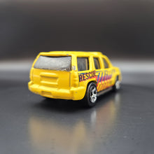 Load image into Gallery viewer, Hot Wheels 2013 '07 Chevy Tahoe Yellow #13 HW City Rescue 3/10