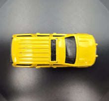 Load image into Gallery viewer, Hot Wheels 2013 '07 Chevy Tahoe Yellow #13 HW City Rescue 3/10