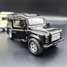 Load image into Gallery viewer, Explorafind 2012 Land Rover Defender with Caravan Black/Cream 1:32 Die Cast