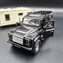 Load image into Gallery viewer, Explorafind 2012 Land Rover Defender with Caravan Black/Cream 1:32 Die Cast