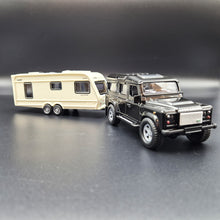 Load image into Gallery viewer, Explorafind 2012 Land Rover Defender with Caravan Black/Cream 1:32 Die Cast