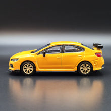 Load image into Gallery viewer, Explorafind 2016 Subaru WRX STI S207 Yellow 1:64 Die Cast Car