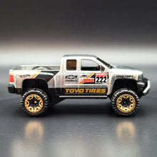 Load image into Gallery viewer, Hot Wheels 2022 Chevy Silverado Off Road ZAMAC Themed Multipack Exclusive