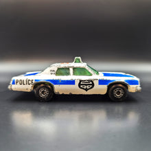 Load image into Gallery viewer, Matchbox 1984 Plymouth Gran Fury White #10 1-75 Collection
