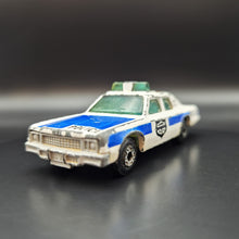 Load image into Gallery viewer, Matchbox 1984 Plymouth Gran Fury White #10 1-75 Collection