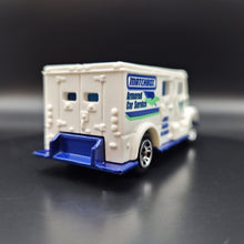 Load image into Gallery viewer, Matchbox 2016 International Armored Car White #17 MBX Adventure City