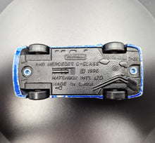 Load image into Gallery viewer, Matchbox 1996 AMG Mercedes C Class Blue #35 1-75 Superfast