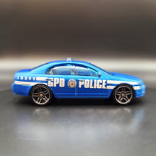 Load image into Gallery viewer, Hot Wheels 2009 Ford Fusion Satin Blue Batman Pack Loose