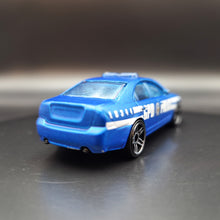 Load image into Gallery viewer, Hot Wheels 2009 Ford Fusion Satin Blue Batman Pack Loose