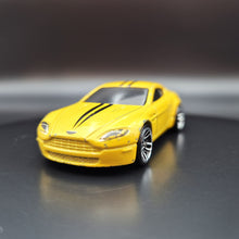 Load image into Gallery viewer, Hot Wheels 2020 Aston Martin V8 Vantage Yellow HW Exotics 5 Pack Loose