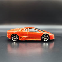Load image into Gallery viewer, Hot Wheels 2010 Lamborghini Reventón Orange #71 HW Garage 3/10
