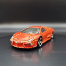 Load image into Gallery viewer, Hot Wheels 2010 Lamborghini Reventón Orange #71 HW Garage 3/10