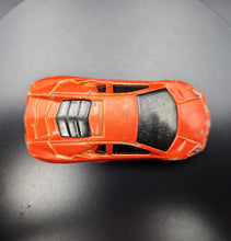 Load image into Gallery viewer, Hot Wheels 2010 Lamborghini Reventón Orange #71 HW Garage 3/10