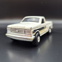 Load image into Gallery viewer, ERTL 1990 Ford F-150 Pickup White CAT Caterpillar Series