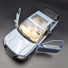 Load image into Gallery viewer, Bburago 2004 Land Rover Freelander Light Blue 1:24 Die Cast