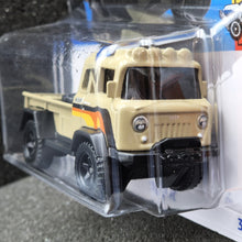 Load image into Gallery viewer, Hot Wheels 2024 '57 Jeep FC Tan HW Hot Trucks 3/10 New Long Card