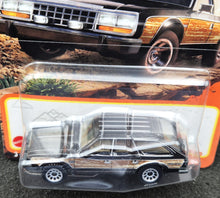 Load image into Gallery viewer, Matchbox 2024 1980 AMC Eagle Black #22 MBX Adventure New Long Card