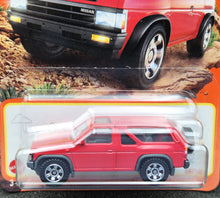 Load image into Gallery viewer, Matchbox 2024 1985 Nissan Pathfinder Red #54 MBX Adventure New Long Card