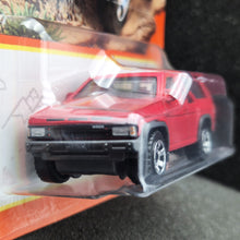 Load image into Gallery viewer, Matchbox 2024 1985 Nissan Pathfinder Red #54 MBX Adventure New Long Card