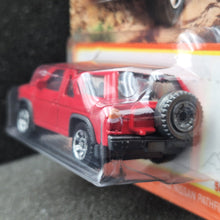 Load image into Gallery viewer, Matchbox 2024 1985 Nissan Pathfinder Red #54 MBX Adventure New Long Card