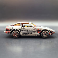 Load image into Gallery viewer, Matchbox 1983 Datsun 280 ZX Black #24 Matchbox 1-75 Series