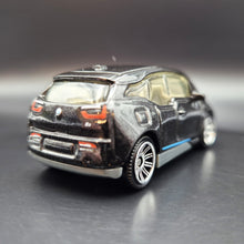 Load image into Gallery viewer, Matchbox 2017 '15 BMW i3 Black #5 MBX Adventure City