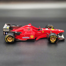 Load image into Gallery viewer, Maisto 1996 Ferrari F310/2 Formula 1 Red 1:20 Die Cast Car - Michael Schumacher
