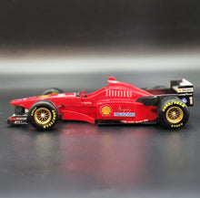Load image into Gallery viewer, Maisto 1996 Ferrari F310/2 Formula 1 Red 1:20 Die Cast Car - Michael Schumacher