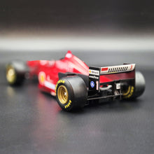 Load image into Gallery viewer, Maisto 1996 Ferrari F310/2 Formula 1 Red 1:20 Die Cast Car - Michael Schumacher