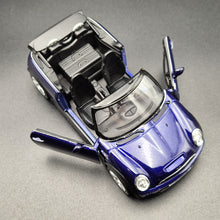 Load image into Gallery viewer, Welly 2010 Mini Cooper S Cabrio Purple #42359 1:36 Collection Series