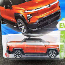 Load image into Gallery viewer, Hot Wheels 2025 Silverado EV RST Orange #86 HW EV 6/10 New Long Card