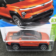 Load image into Gallery viewer, Hot Wheels 2025 Silverado EV RST Orange #86 HW EV 6/10 New Long Card