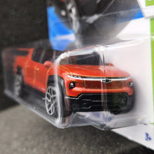 Load image into Gallery viewer, Hot Wheels 2025 Silverado EV RST Orange #86 HW EV 6/10 New Long Card