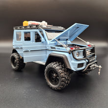 Load image into Gallery viewer, Explorafind 2019 Mercedes-Benz G550 4x4 Squared Sky Blue 1:24 Die Cast SUV