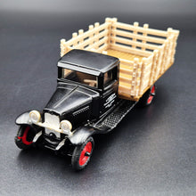 Load image into Gallery viewer, ERTL 1930 Chevrolet Stake Truck Black Livestock Transportation Carl Jones Prop #2503 1:43 Diecast Model