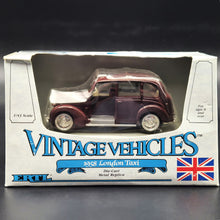 Load image into Gallery viewer, ERTL 1958 London Taxi-Austin FX3 3 Door Taxi Cab Maroon #2551 1:43 ERTL Vintage Vehicles Diecast Model