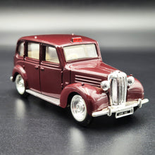 Load image into Gallery viewer, ERTL 1958 London Taxi-Austin FX3 3 Door Taxi Cab Maroon #2551 1:43 ERTL Vintage Vehicles Diecast Model