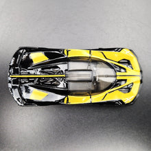 Load image into Gallery viewer, Hot Wheels 2024 Bugatti Bolide Black/Yellow #185 HW Exotics 3/10