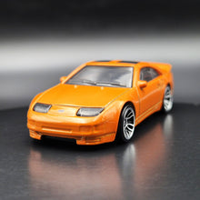 Load image into Gallery viewer, Hot Wheels 2024 Nissan 300ZX Twin Turbo Orange Nightburnerz 5 Pack Exclusive
