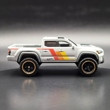 Load image into Gallery viewer, Hot Wheels 2024 '20 Toyota Tacoma Light Grey HW Remote Adventures 5 Pack Exclusive