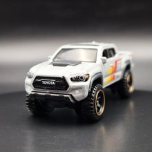 Load image into Gallery viewer, Hot Wheels 2024 '20 Toyota Tacoma Light Grey HW Remote Adventures 5 Pack Exclusive