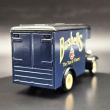 Load image into Gallery viewer, Lledo Days Gone 1934 Dennis Parcels Van "Bushells" "The Tea of Flavor" DG16007