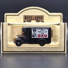 Load image into Gallery viewer, Lledo Days Gone 1934 Dennis Parcels Van City & Suburban Carriers Ltd OXO Dark Blue DG16023