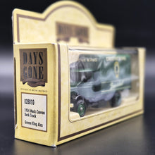 Load image into Gallery viewer, Lledo Days Gone 1934 Mack Canvas Backed Truck Greene King Ales Dark Green DG28010