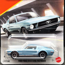 Load image into Gallery viewer, Matchbox 2025 1968 Ford Mustang Fastback Tahoe Turquoise #67 MBX Showroom New Long Card