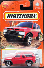 Load image into Gallery viewer, Matchbox 2024 1985 Nissan Pathfinder Red #54 MBX Adventure New Long Card