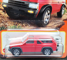 Load image into Gallery viewer, Matchbox 2024 1985 Nissan Pathfinder Red #54 MBX Adventure New Long Card
