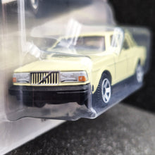 Load image into Gallery viewer, Matchbox 2025 1986 Volvo 240 Cream Yellow #122 MBX Showroom New Long Card