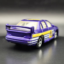 Load image into Gallery viewer, Matchbox 1998 Ford Falcon (EF) Purple #68 Matchbox 1-75 Series